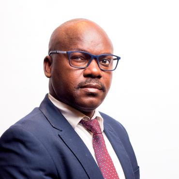Dr. Mbako Mbo