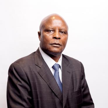 Dr. Wilfred Mandlebe 